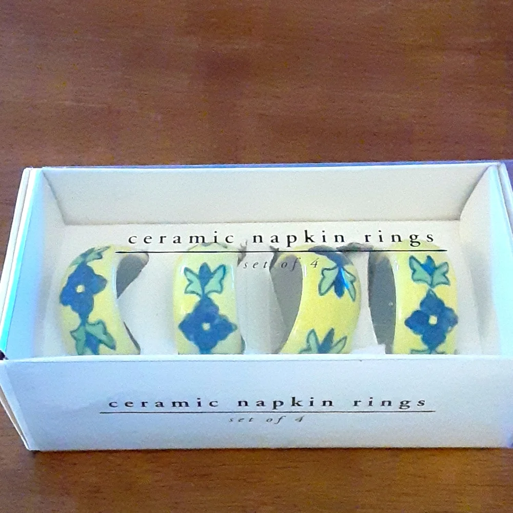 Pier 1 yellow blue green ceramic napkin rings set Of 4 LIKE NEW IN BOX